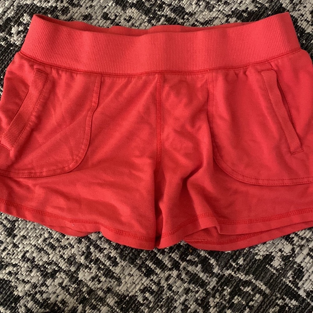 Red athletic shorts from ATHLETIC WORKS